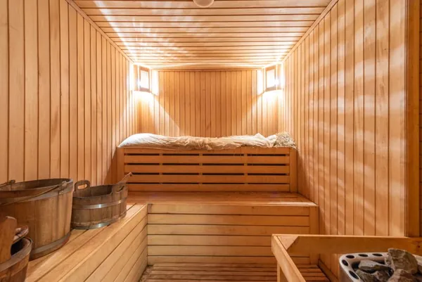Traditional sauna interior with wooden buckets